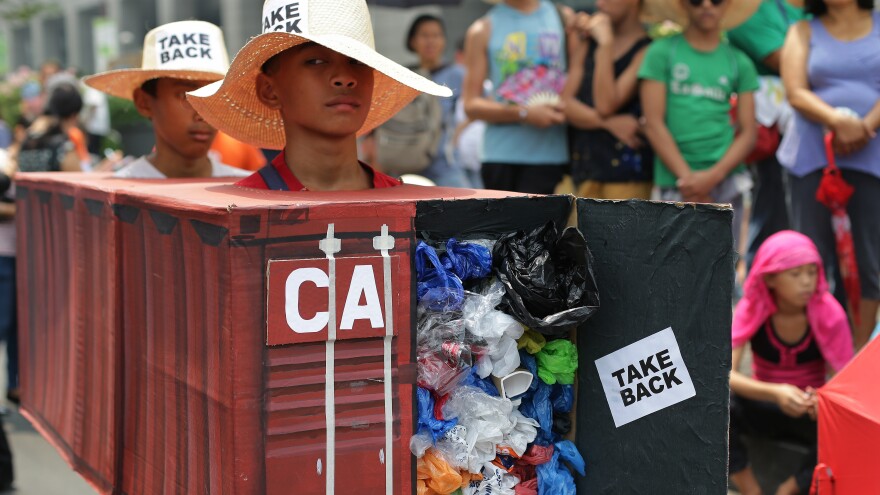 "I want a boat prepared" to take tons of trash back to Canada, Philippines President Rodrigo Duterte said Tuesday. In this 2015 photo, Filipino activists wear shipping container costumes to call on Canada to remove the garbage from a port in Manila.