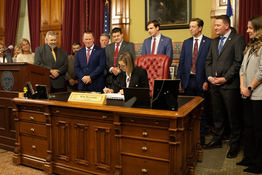 Gov. Kim Reynolds signs into law changes to Iowa's MEGA program for major economic development incentives.