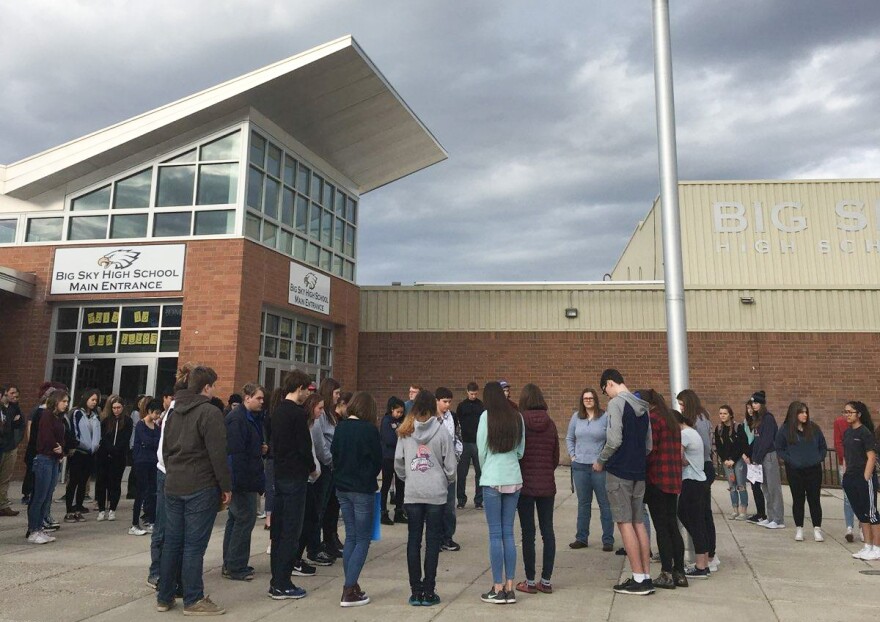 Students at Missoula's Big Sky High School observe a moment of silence during the national school walkout, March 14, 2018.