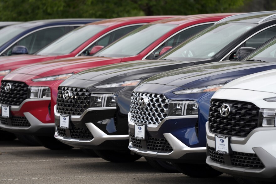 A line of 2022 Santa Fe SUV's sit outside a Hyundai dealership Sunday, Sept. 12, 2021, in Littleton, Colo. Nearly three months after Hyundai and Kia rolled out new software designed to thwart rampant auto thefts, crooks are still driving off with the vehicles at an alarming rate.