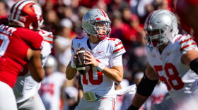Ohio State quarterback Julian Sayin drops to pass during a college football game.