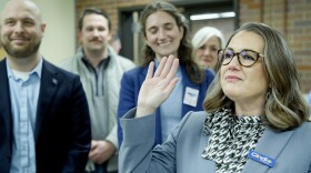 Cindi Clayton, Democratic candidate for Indiana Senate District 49, finishes her courtesy filing with an oath at the Vanderburgh County Civic Center, Tuesday Feb. 3. She's running against four-term Republican Jim Tomes in the November General Election.