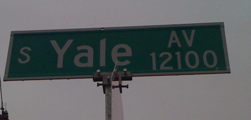 A street sign marks the intersection at 121st and South Yale Avenue.