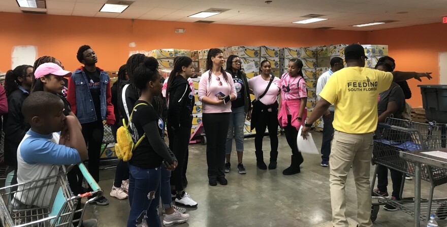 The Greater Fort Lauderdale Chapter of the service organization, Jack and Jill of America, brought elementary and high school students to sort food at Feeding South Florida on Monday morning.