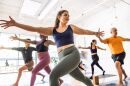 People participate in a group fitness class, part of the growing focus on exercise and lifestyle changes tied to weight management and chronic disease prevention.