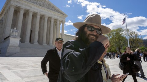 Los Angeles artist Erik Brunetti, the founder of the streetwear clothing company FUCT, leaves the Supreme Court after his trademark case was argued on April 15.
