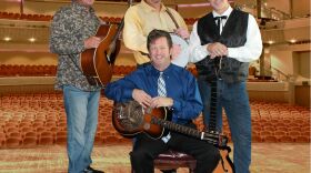 The Farm Hands.  In photo, in back left to right, Keith Tew, Don Hill, Daryl Mosley; seated, Tim Graves