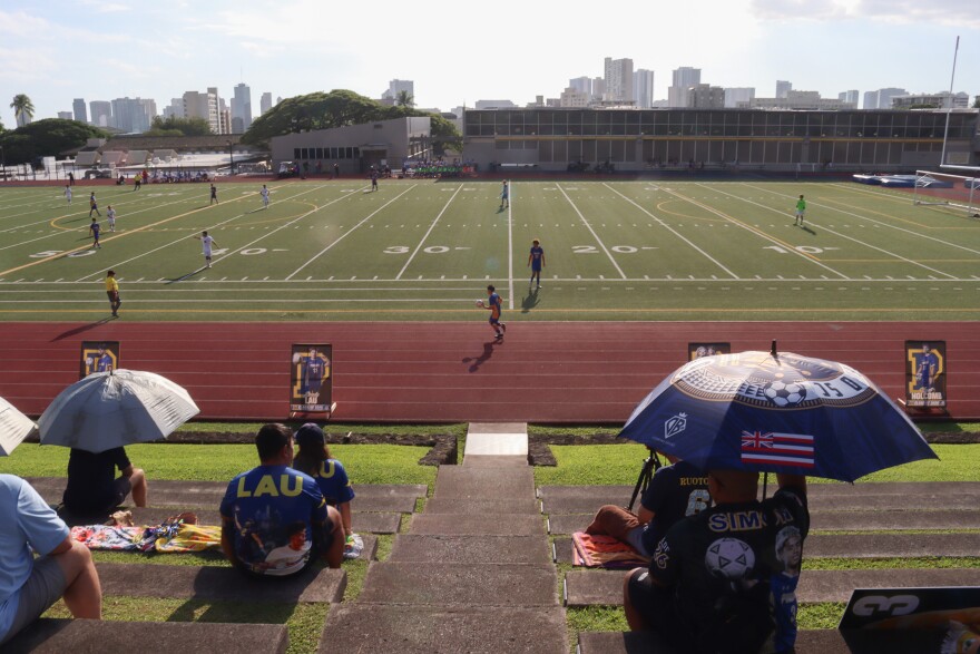 Family and friends watch a high school soccer game between Punahou and Saint Louis at Punahou School on Jan. 8, 2026.