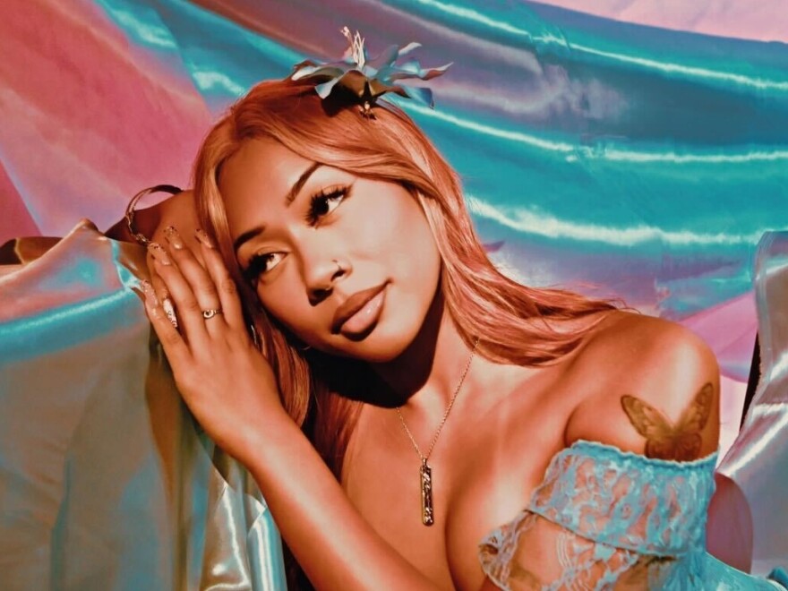 Dallas-based singer Kali Flowers moved from Oahu, Hawai to Dallas in 2003. Flowers blends poetic lyrics and lush harmonies into a smooth RnB pop sound in her debut EP, Saltwater Secrets.