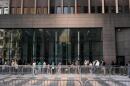 People wait in line to enter immigration courts and services in New York, Monday, July 27, 2026. (Seth Wenig/AP)