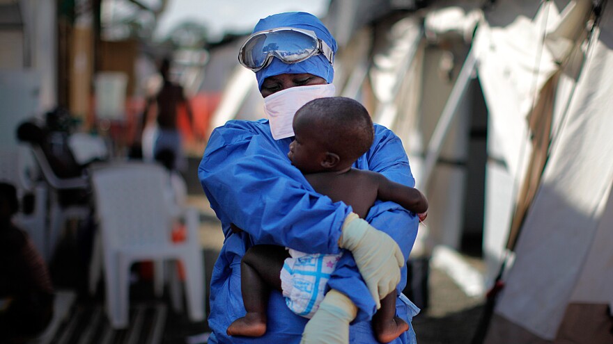 Salome Karwah holds a 10-month-old baby whose parents were treated for Ebola in the Doctors Without Borders center in Monrovia, Liberia. The photo was taken in 2014.