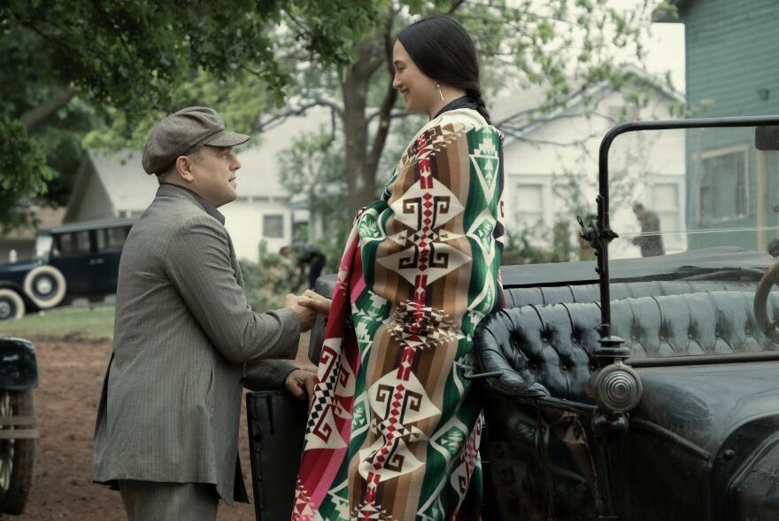 Leonardo DiCaprio as Ernest Burkhart (left) and Lily Gladstone as Mollie Kyle in "Killers of the Flower Moon."