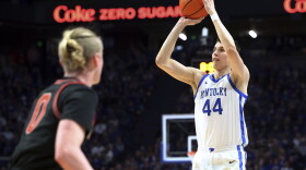 Kentucky's Zvonimir Ivisic (44) shoots as Georgia's Blue Cain watches during the first half of an NCAA college basketball game Saturday, Jan. 20, 2024, in Lexington, Ky. (AP Photo/James Crisp)