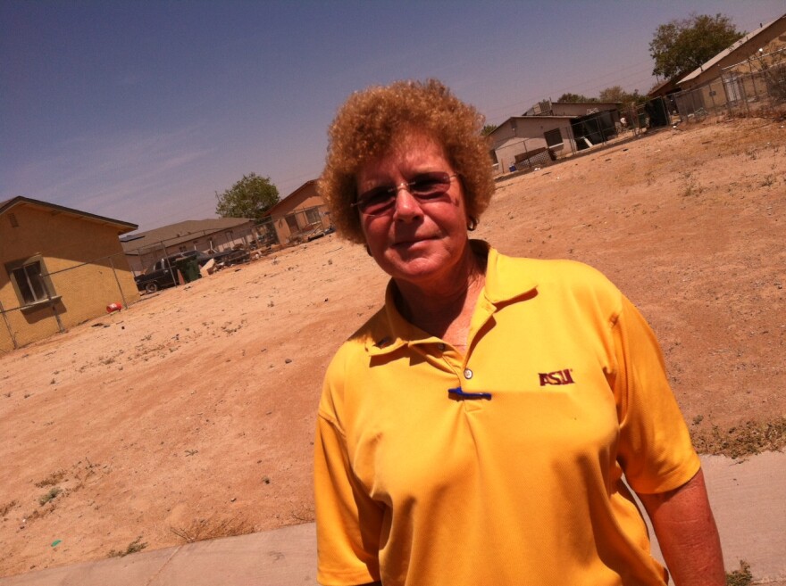 State Climatologist Nancy Selover says low-income neighborhoods like this one near Phoenix will be most vulnerable as the city gets hotter and drier. 