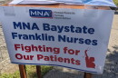 A sign that advocates for union nurses at Baystate Franklin Medical Center in Greenfield