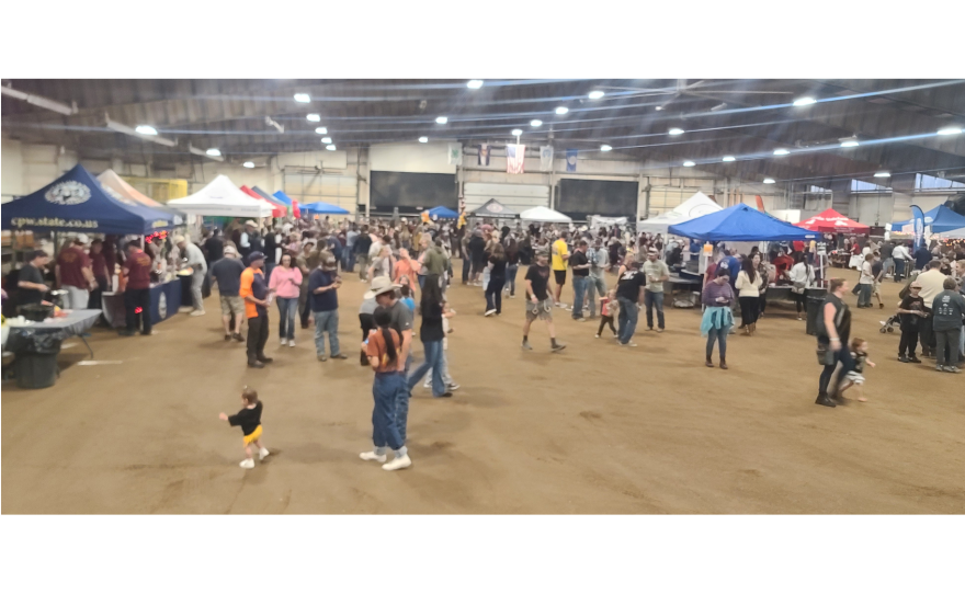 The crowd mills through dozens of tents serving chilis and salsas