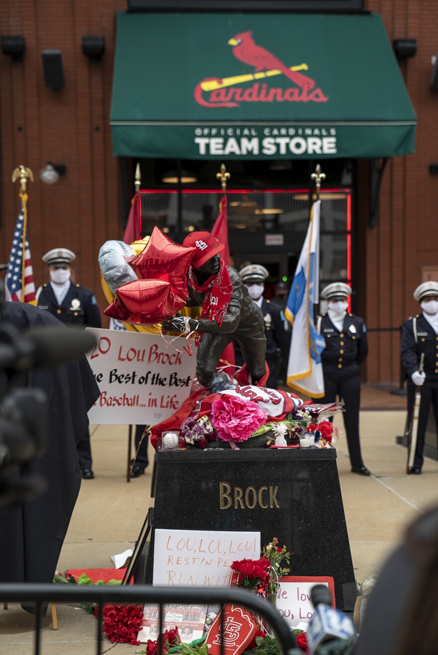 Lou Brock's statue outside of Busch Stadium on Sept. 12. Family, friends and fans of him honored his life and storied career this weekend.