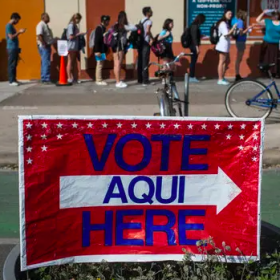  A bilingual voting sign outside a precinct in Texas.