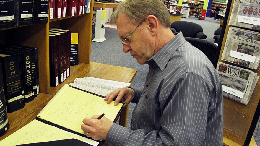Ray Meyer researches potential employers at the library near his home in Kirkwood, Mo. He says the uncertainty of temp work is gnawing away at him.