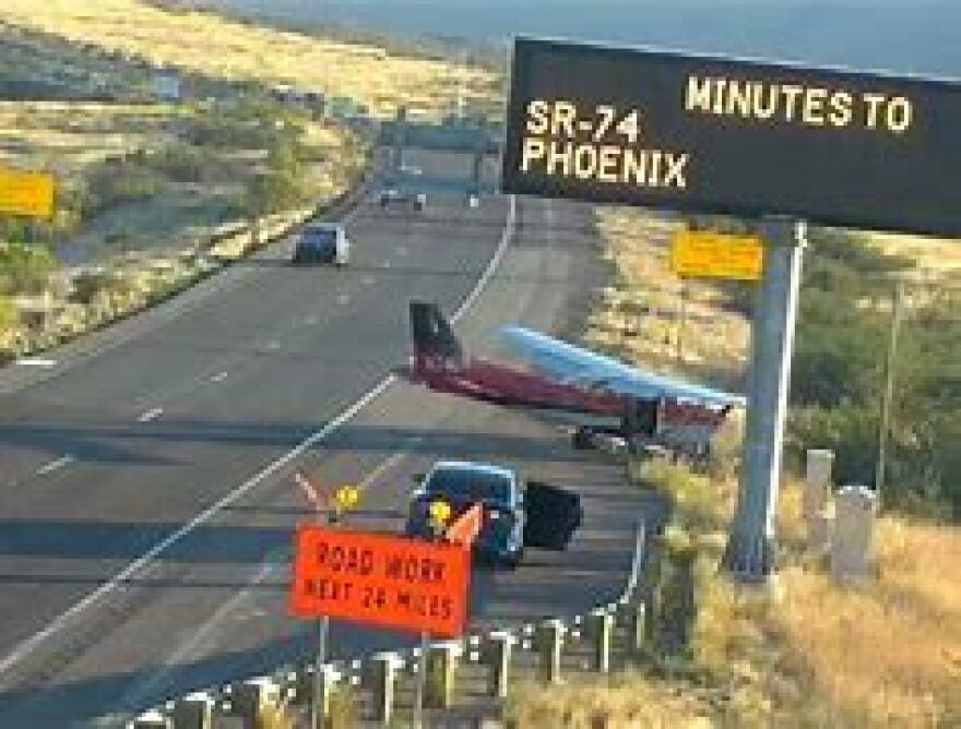 A Cessna 172 lands on I-17 southbound near Sunset Point Tuesday, September, 6, 2023.