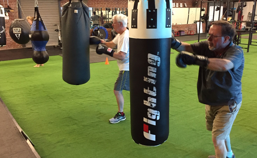 At K.O.R.E. Wellness gym, Rock Steady boxers fight their Parkinson's Disease as a team.