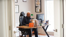 Larry Fulton works from a home office on Friday, Jan. 5, 2024.
