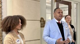C.J. Webber-Neal, center, of Sooner State Party, speaks at a press conference in support of the state Election Board’s decision to keep voter data private. Cecilia Isac, left, and Regan Burns, right, stand with Webber-Neal outside the Election Board’s offices at the Capitol on Feb. 16, 2025.