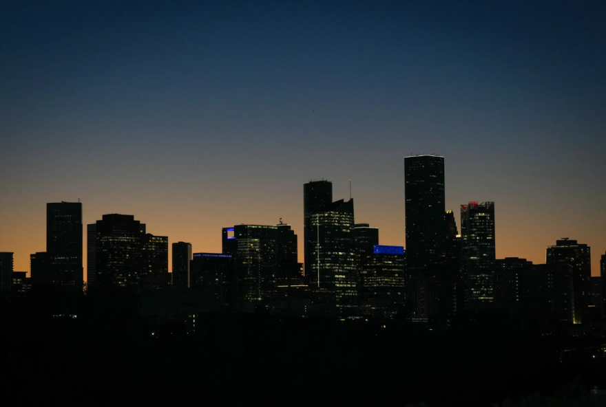 The sun sets behind downtown Nov. 9, 2025, in Houston. Waller County, just northeast of Houston, was the fastest-growing county in the state and the second-fastest-growing county in the country between July 1, 2024, and July 1, 2025.