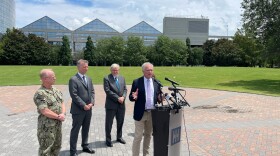 Sen. Tim Kaine outside HII in Newport News, with Adml. Daryl Caudle, Navy Undersecretary Erik Ravens and Australian Ambassador Kevin Rudd. July 14, 2023. Photo by Steve Walsh