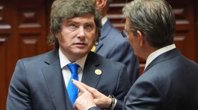 Argentina's President Javier Milei, left, talks to Bolivia's President Rodrigo Paz the inauguration of Peru's new President Keiko Fujimori in Lima, Peru, Tuesday, July 28, 2026.