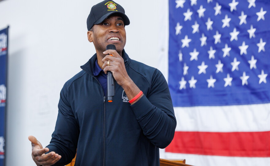 Republican nominee for governor John James speaks to volunteers in Lansing Township, Mich., on Oct. 24, 2026, during a stop on Republican U.S. Senate nominee Mike Rogers' "We Have a State to Save" bus tour.