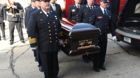 Firefighters carry the casket of retired Manchester Fire Chief Andre Parent, 62, who died April 7, 2026, after a battle with stomach cancer.
