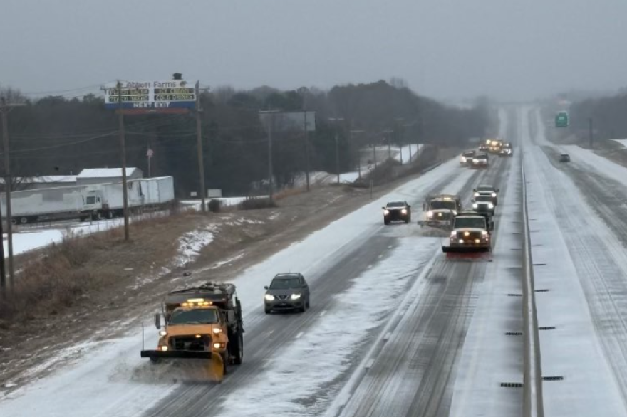 Transportation crews work to clear Interstate 85 from ice and snow on Sunday, Jan. 25, 2026.
