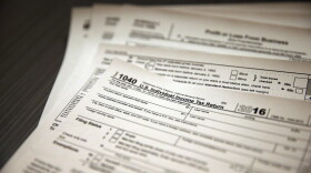 In this Jan. 14, 2017, photo, tax forms sit on a desk at the start of the tax season rush, inside the offices of tax preparation firm Infinite Tax Solutions, in Boulder, Colo. (Brennan Linsley/AP)