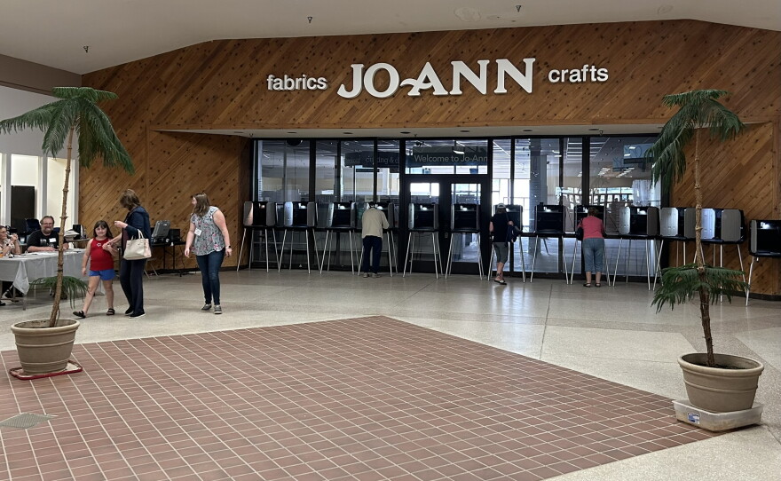 Hibbing's Precinct 4 polling site is located in Irongate Plaza, where voters congregated for the Aug. 11, 2026, midterm primary.