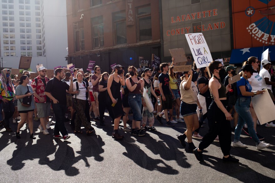 Abortion rights activists march in Detroit following the Supreme Court's decision in the Dobbs v. Jackson Women's Health case.