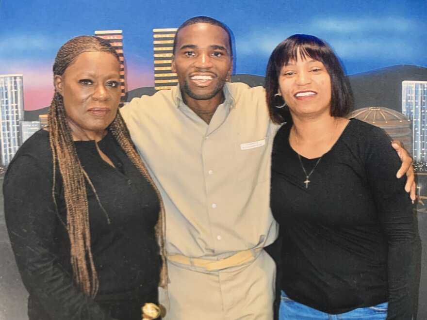 Bobby Everson with his aunt Angela Everson (left) and his sister Ebony during a 2018 visit at a federal prison in South Carolina.