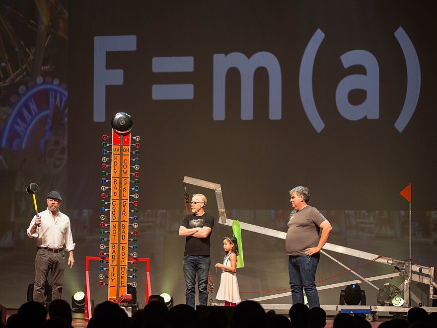 Jamie Hyneman, left, and Adam Savage, center, appear on stage during 'MythBusters: Behind the Myths' at ACL Live on Dec. 14, 2014 in Austin, Texas.