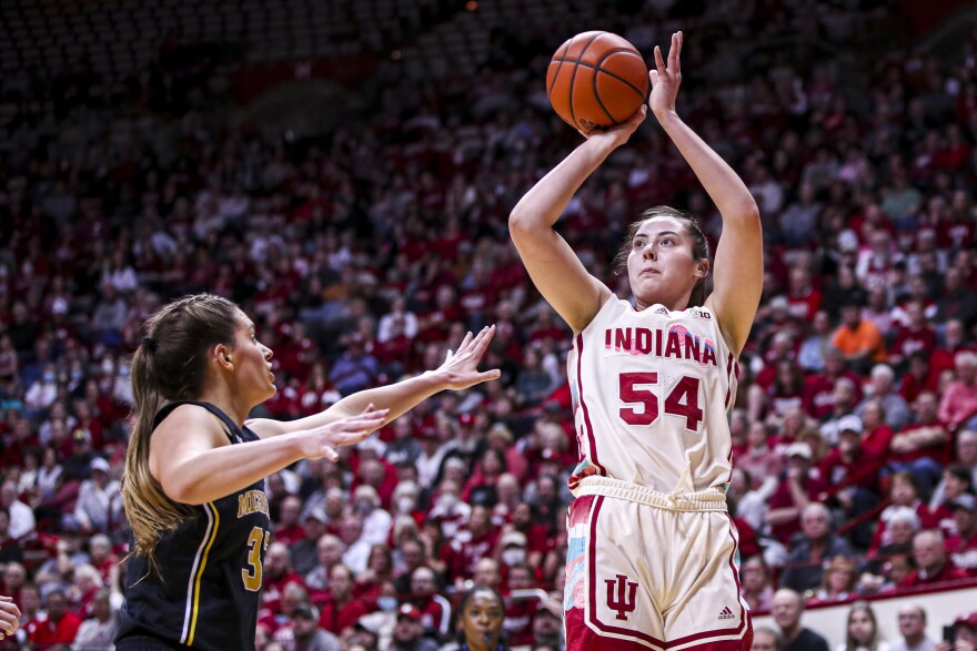 Indiana's Mackenzie Holmes shoots over Michigan's Emily Kiser during Thursday night's game at Simon Skjot Assembly Hall. Holmes had 27 points in the Hoosiers' 68-52 win.