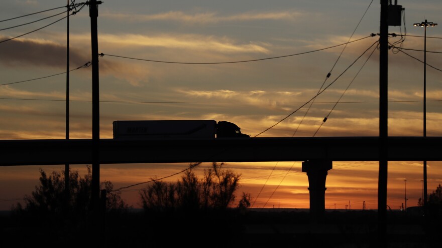 A truck travels on an overpass toward the World Trade Bridge, in Laredo, Texas.