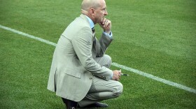  Former North Carolina Courage head coach Paul Riley crouches on the sideline in Cary during a 2019 game. The Courage fired Riley after allegations of sexual harassment and misconduct.