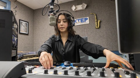 Eileen Espino, a graduate communications student at The University of Texas at El Paso, operates the soundboard during an on-air shift as a student assistant at KTEP 88.5 FM. On Aug. 13, 2026, The University of Texas System Board of Regents approved the framework for an agreement between the University and the El Paso Community Foundation to jointly manage UTEP’s public radio station.