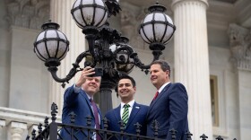 From left, Rep.-elect Jeff Hurd, R-Colo., Rep.-elect Gabe Evans, R-Colo., and Rep.-elect Jeff Crank, R-Colo., pose for a selfie on the steps of the Capitol, Friday, Nov. 15, 2024, in Washington. (AP Photo/Mark Schiefelbein)