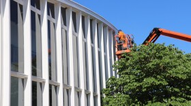 Crews working on bucket lift