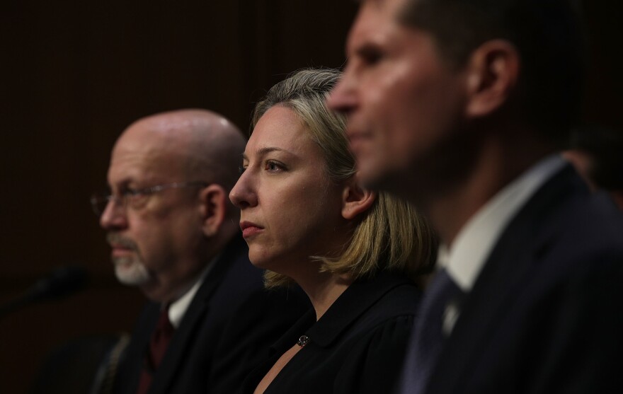 (From left) Sam Liles, acting director of Homeland Security's Office of Intelligence and Analysis Cyber Division, Jeanette Mafra, acting director of DHS' national protection and programs directorate, and Bill Priestap, assistant director of the FBI's Counterintelligence Division, testify during a hearing before the Senate Intelligence Committee on Wednesday.
