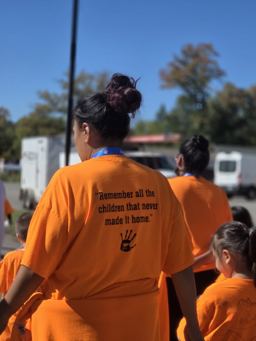 Endazhi Nitaawiging staff members wear orange shirts that say "Every Child Matters" and "Remember the children who never made it home" on Sept. 30, 2026, in Red Lake.