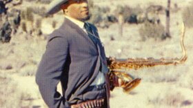 William Claxton's cover photo of Sonny Rollins standing in the desert — sporting a cowboy hat, gun holster and humorously knowing look — has only added to <em>Way Out West</em>'s classic status.