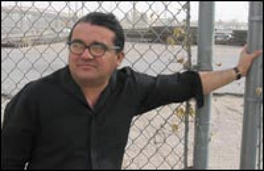 Author David Dorado Romo stands near the site of the old Santa Fe Bridge, where the Bath Riots occurred. The bridge was torn down in the 1920s.