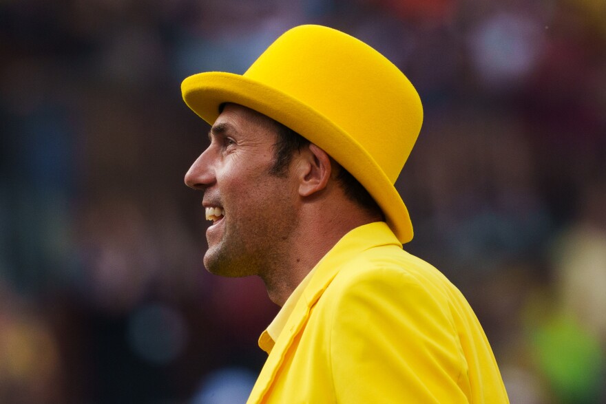 Jesse Cole, owner of the Savannah Bananas, smiles at the full crowd during a baseball game between the Savannah Bananas and the Party Animals at Busch Stadium on Friday, July 18, 2025, in downtown St. Louis.