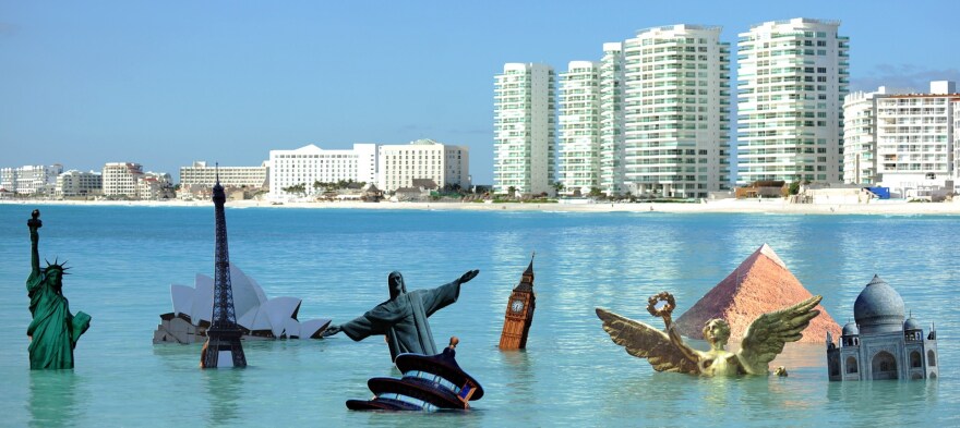 A Greenpeace protest in 2010 juxtaposes the drowning of some of the world's most iconic structures with Cancun, Mexico's, rising skyline.